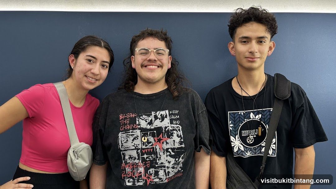 Three young people posing for a photo