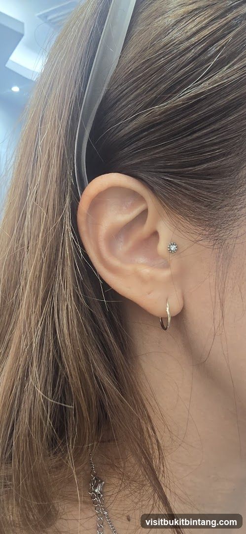 Close-up of a woman's ear with jewelry