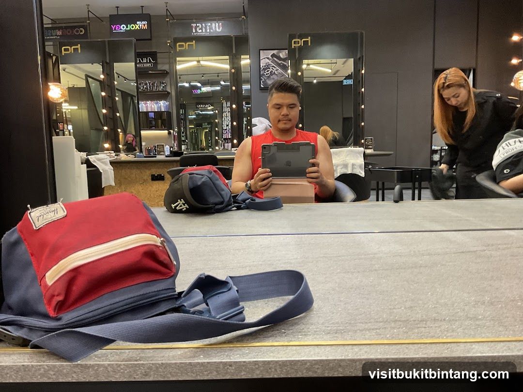 Salon Interior with Man and Stylist