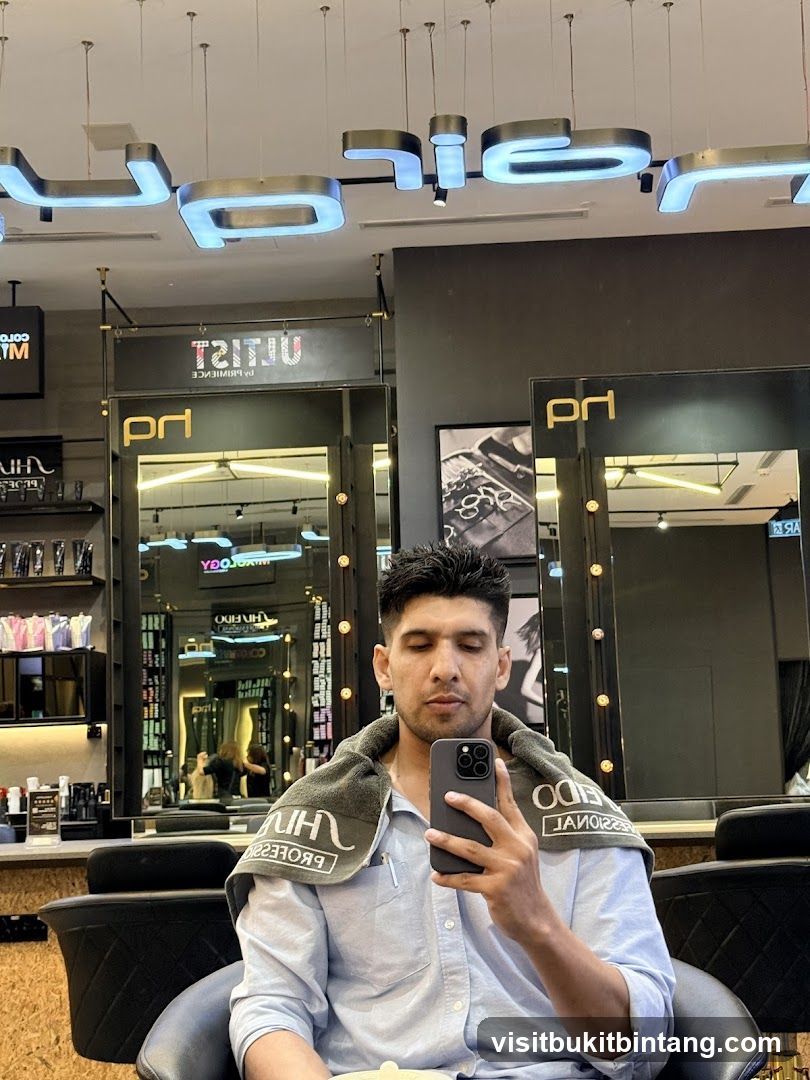 Man taking a selfie in a salon