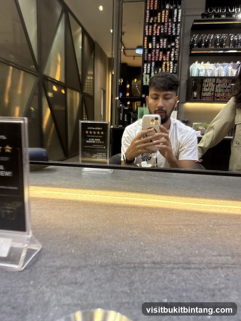Man taking a selfie in a salon