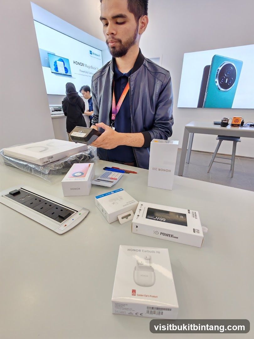 Man holding electronics in a store