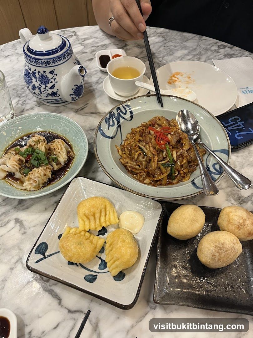 Table with various Asian dishes