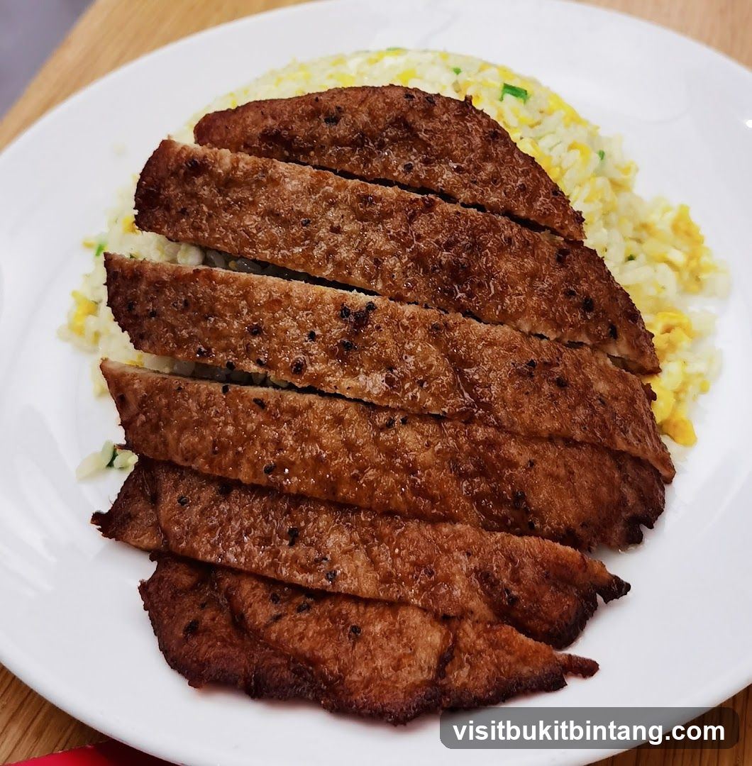 Sliced Pork Chop with Fried Rice