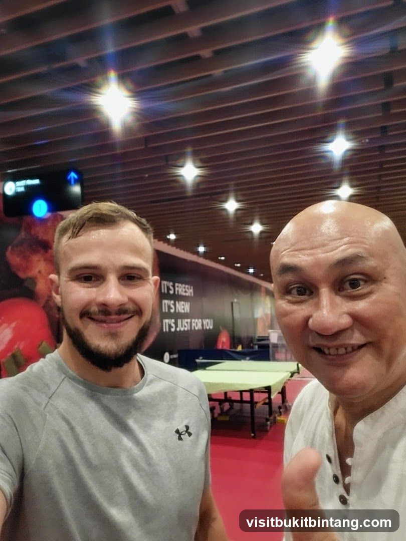 Two men smiling for a selfie