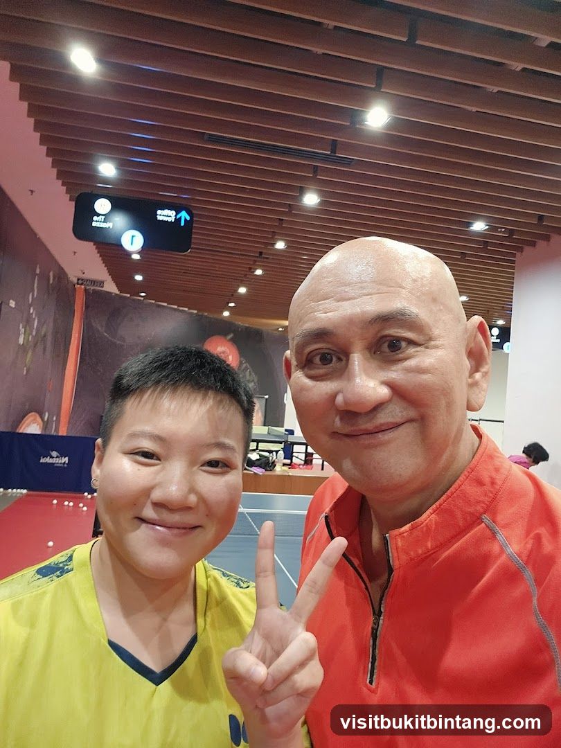 Two people posing for a photo