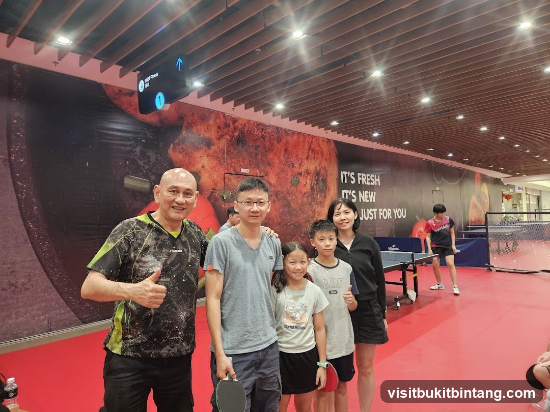 Family playing table tennis
