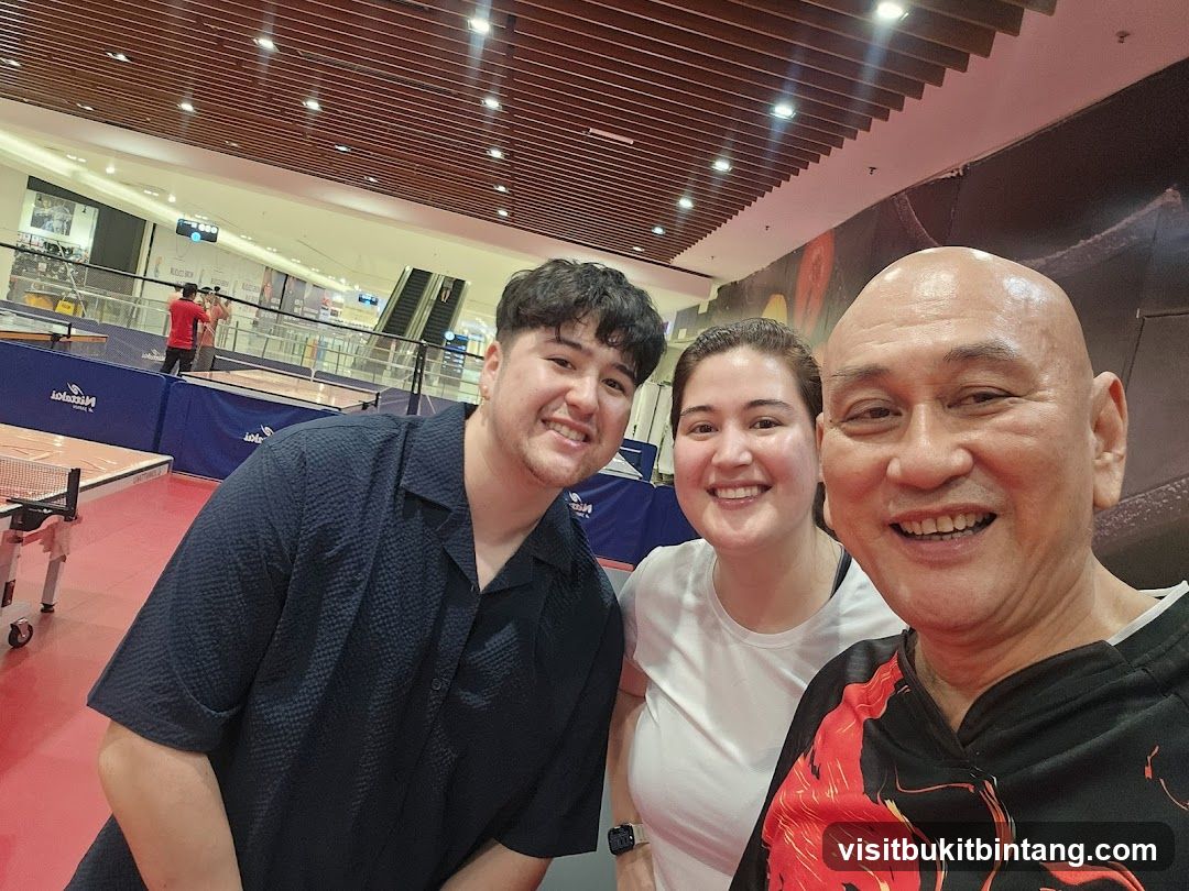 Three people smiling for a selfie
