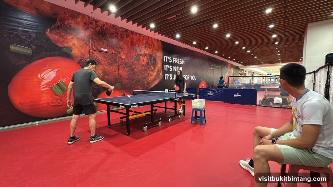 People playing table tennis