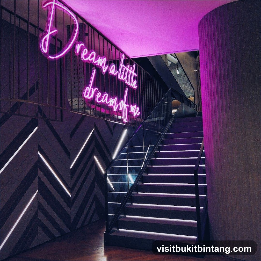 Neon Sign Above Staircase