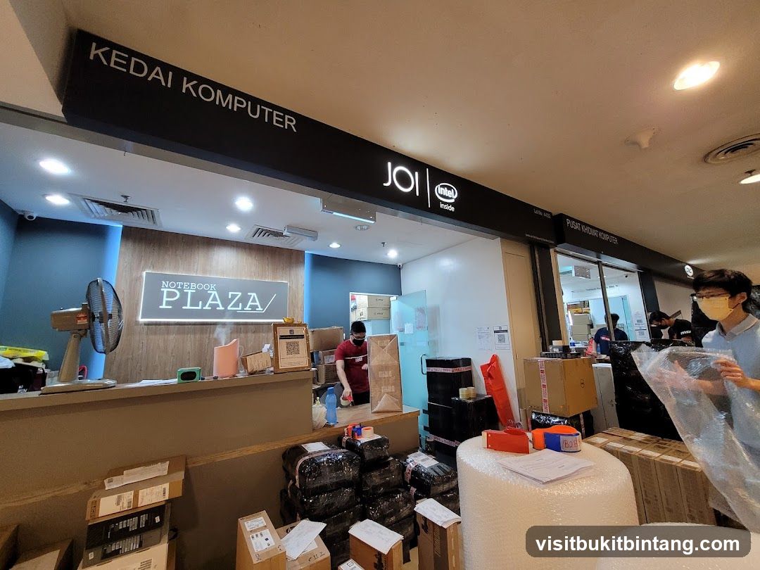 Computer store interior with merchandise