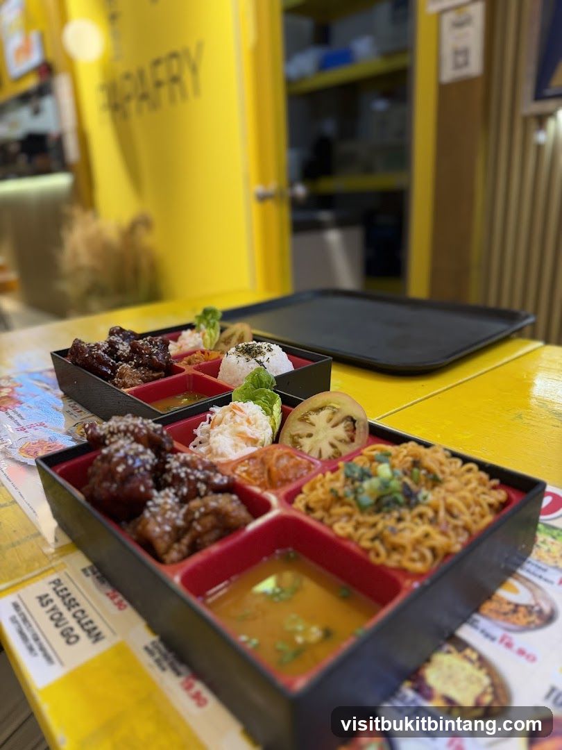 Bento Boxes with Fried Chicken and Noodles