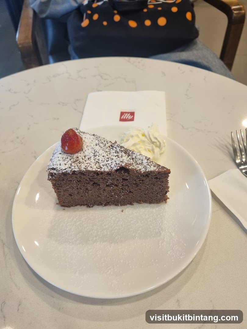 Chocolate cake with strawberry and whipped cream