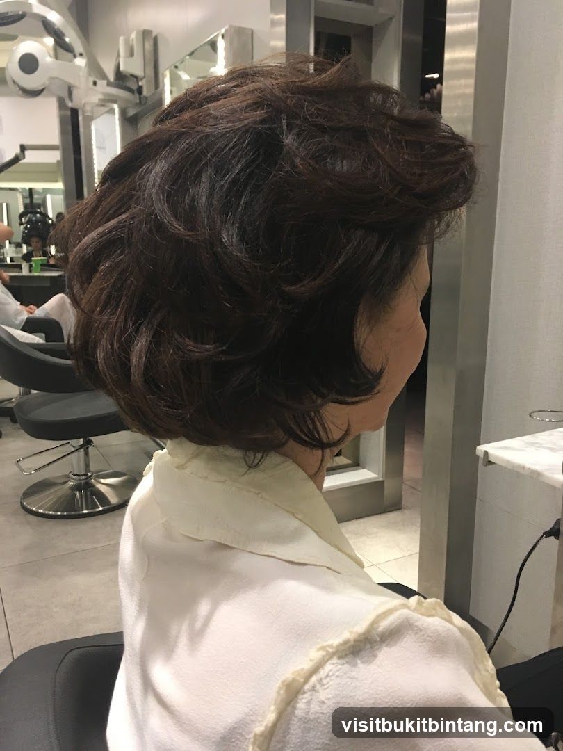 Woman with styled hair in salon