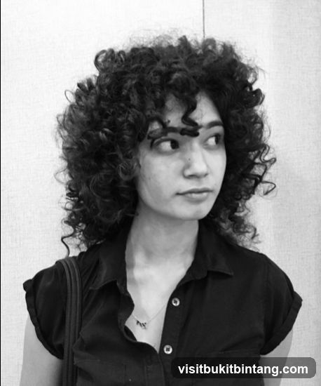 Woman with curly hair
