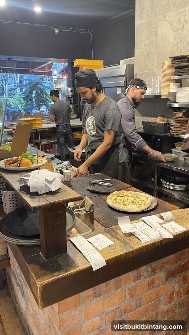 Chefs preparing food in a kitchen