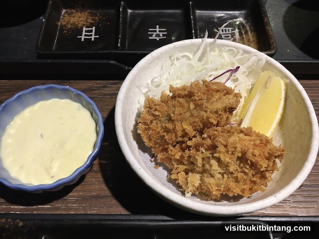 Fried Oysters with Cabbage and Lemon