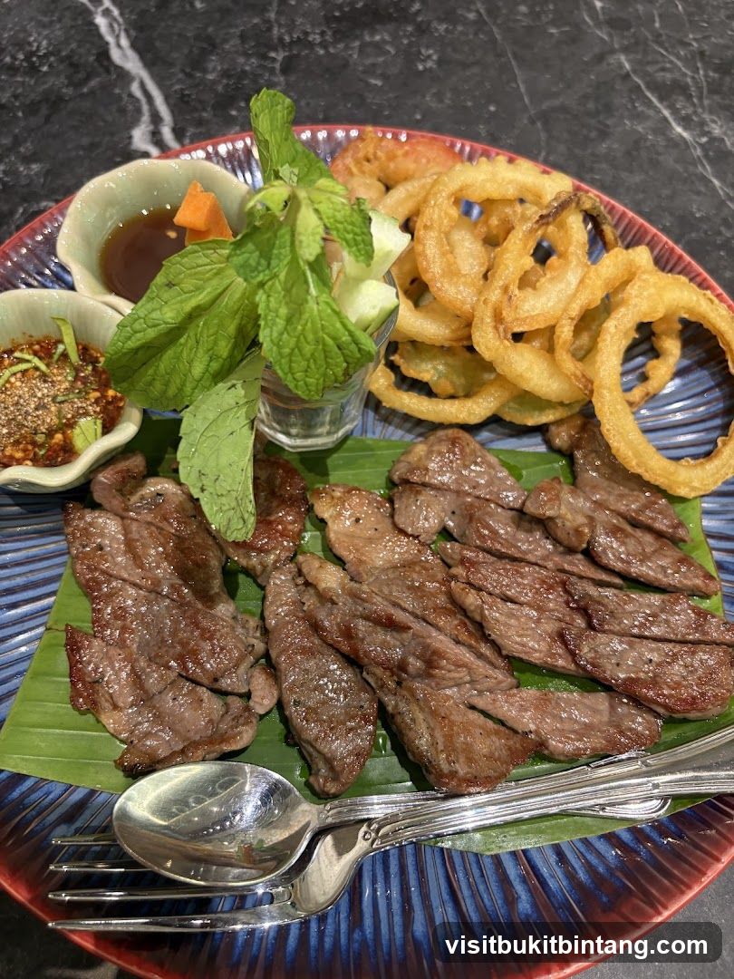 Grilled Beef with Onion Rings and Dipping Sauces
