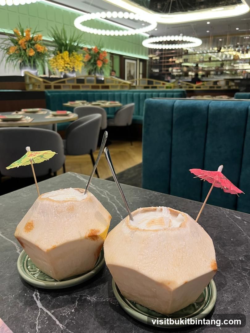 Two Coconuts with Umbrellas