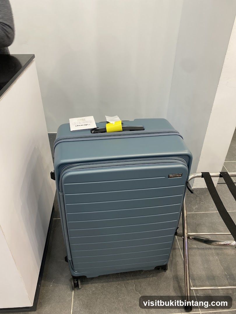 Blue Suitcase with Luggage Tag