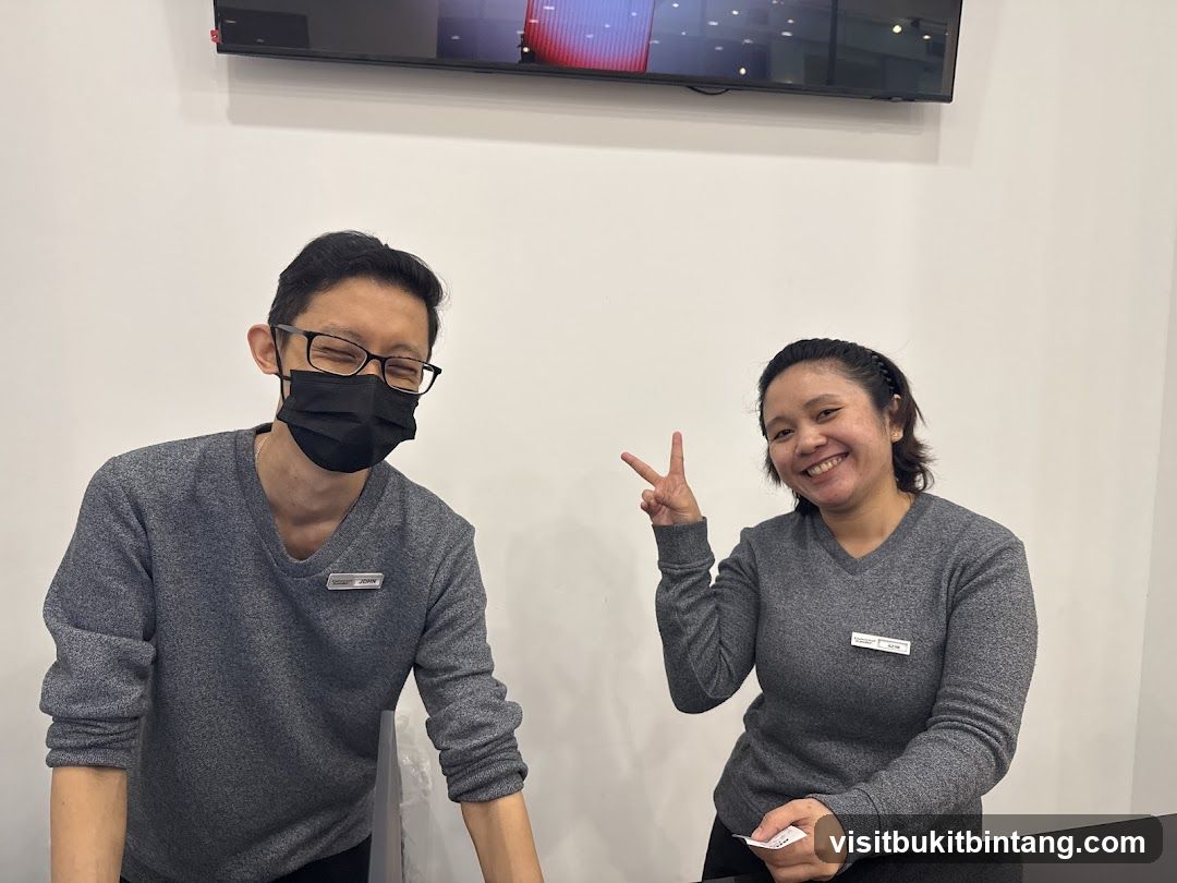 Two Employees Posing
