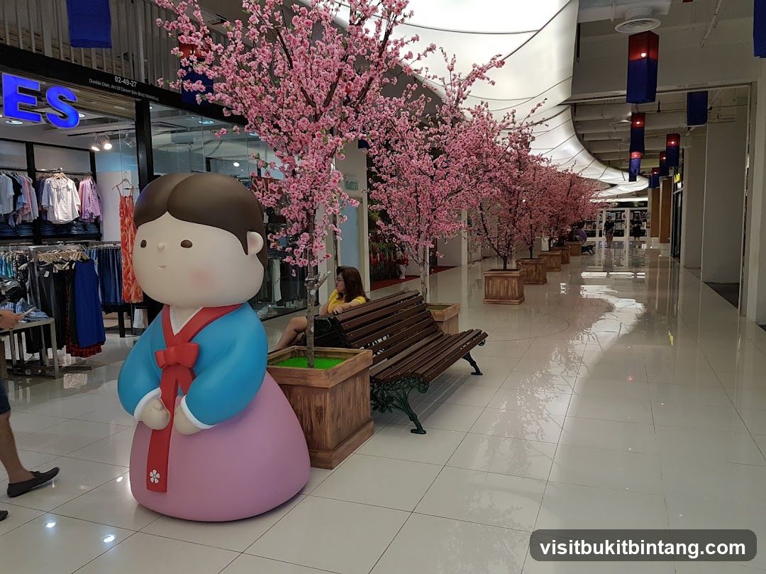 Mall Interior with Cherry Blossoms and Korean Doll