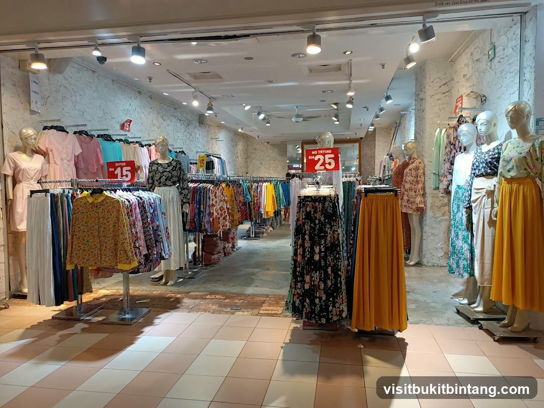 Clothing store interior with mannequins and racks of clothes
