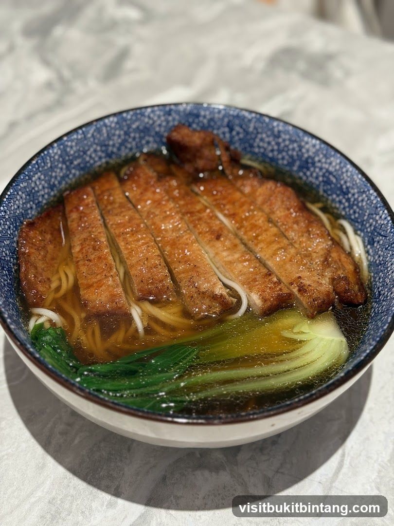 Noodle Soup with Sliced Meat and Greens