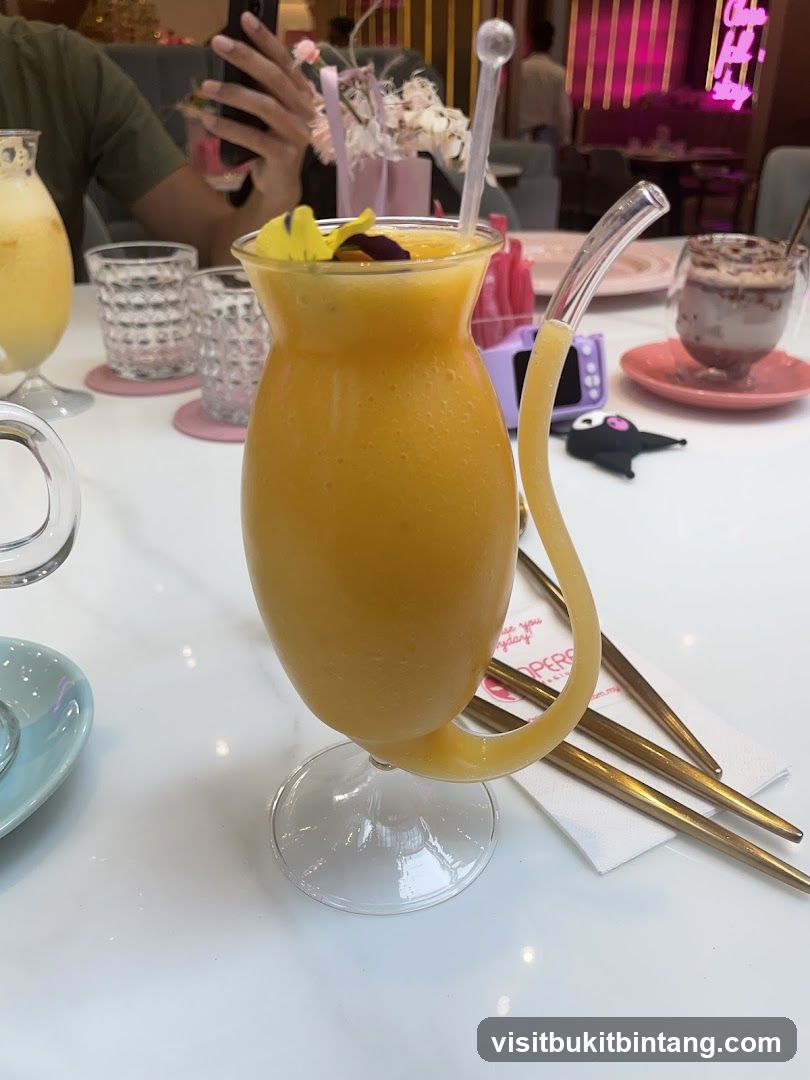 Orange Smoothie with Edible Flowers