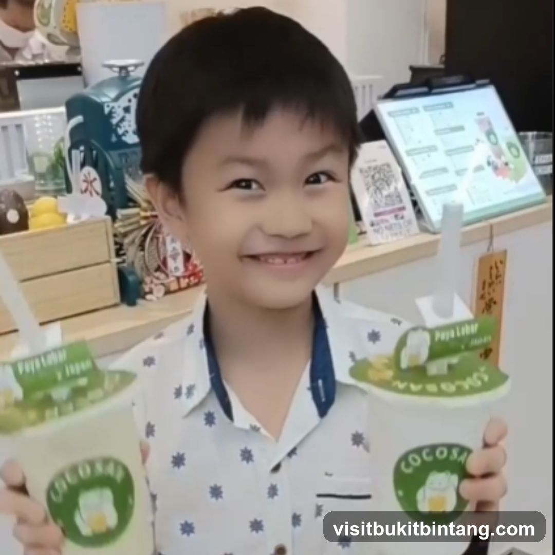 Boy Holding Drinks