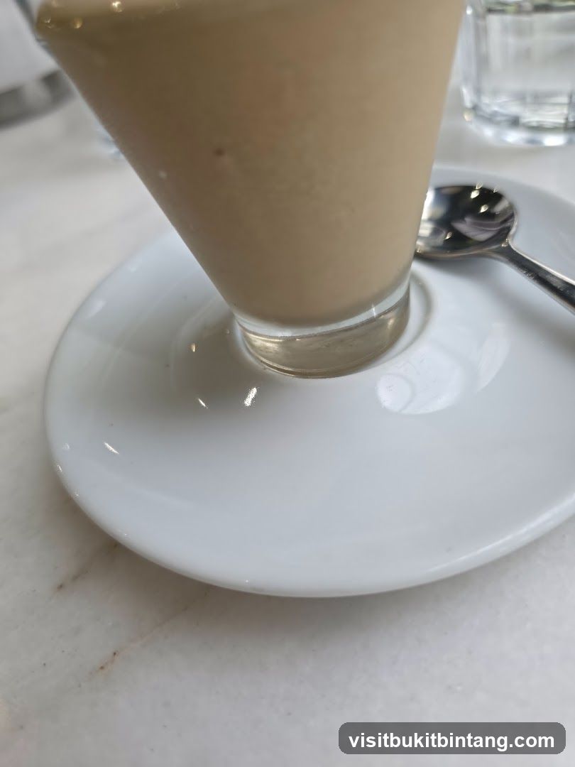 Coffee drink with spoon and saucer