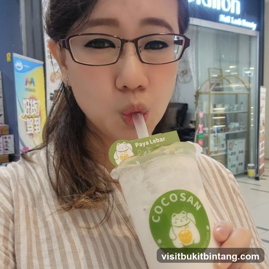 Woman Drinking a Beverage