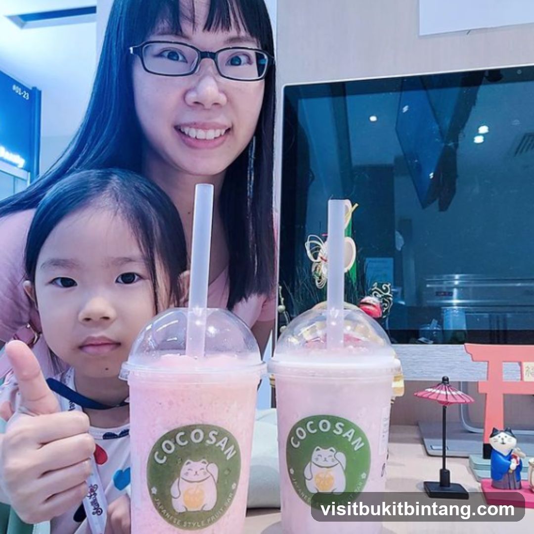 Mother and daughter with drinks