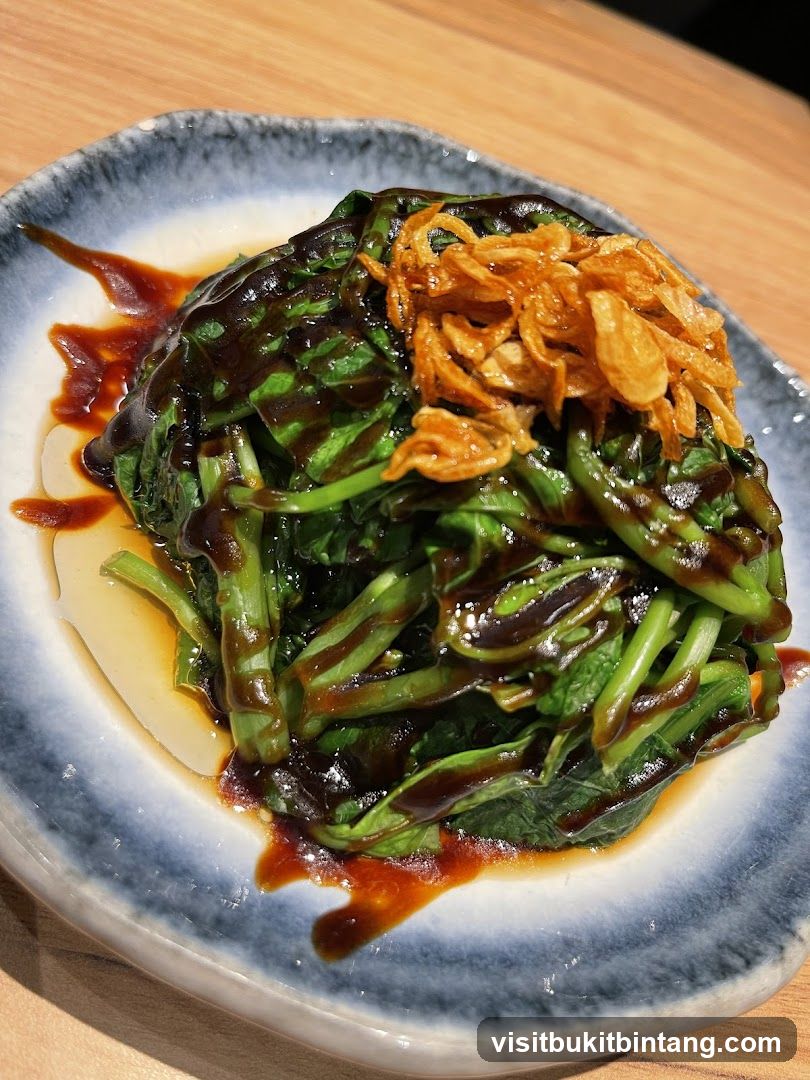 Vegetable Dish with Sauce and Crispy Onions