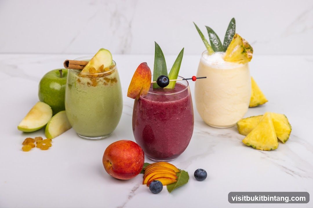 Three Smoothies with Fruit Garnishes