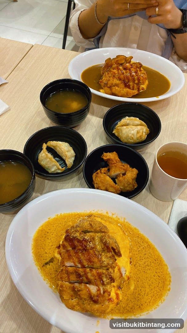 Japanese Curry Rice with Fried Chicken and Gyoza