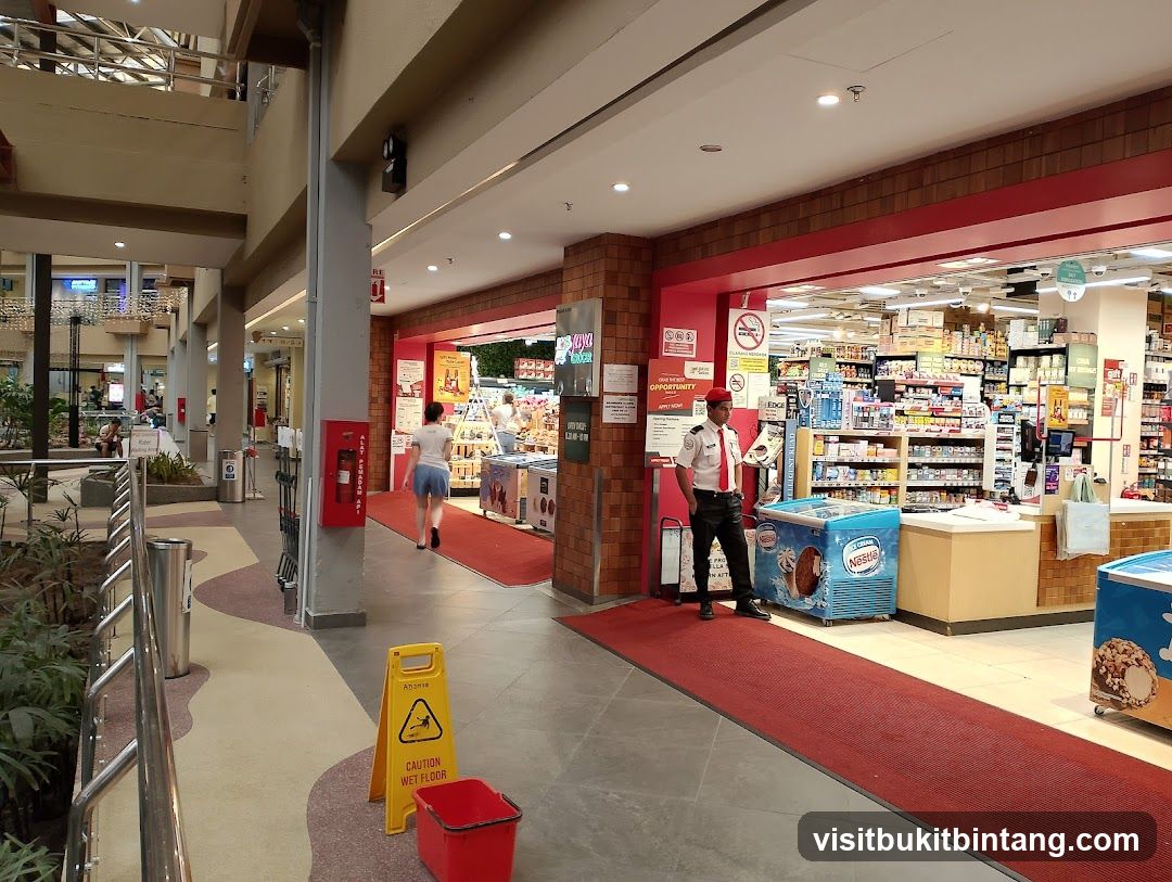 Supermarket Entrance with Security Guard