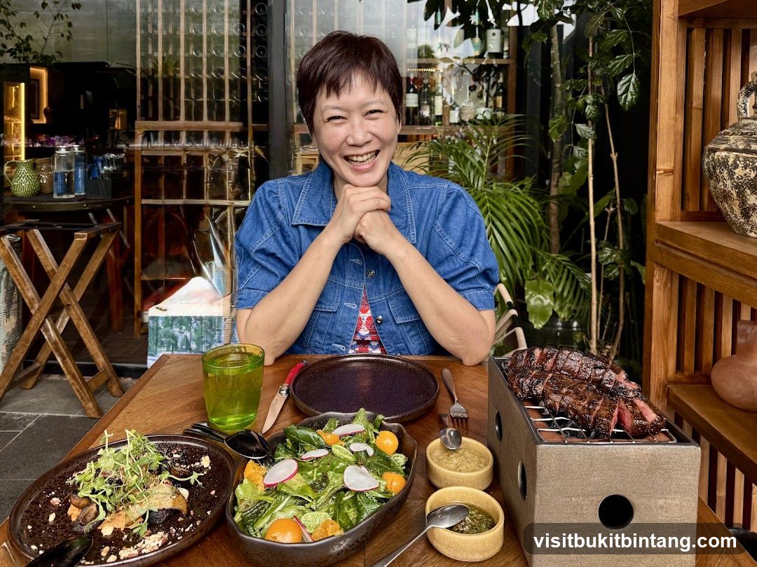 Woman enjoying a meal at a restaurant