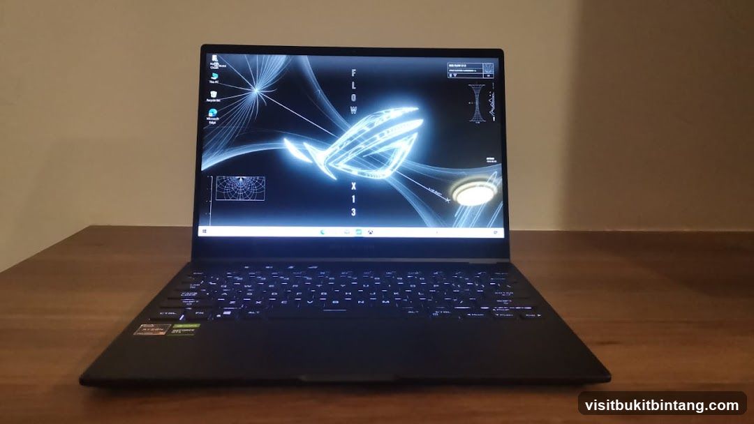 Laptop with ROG wallpaper