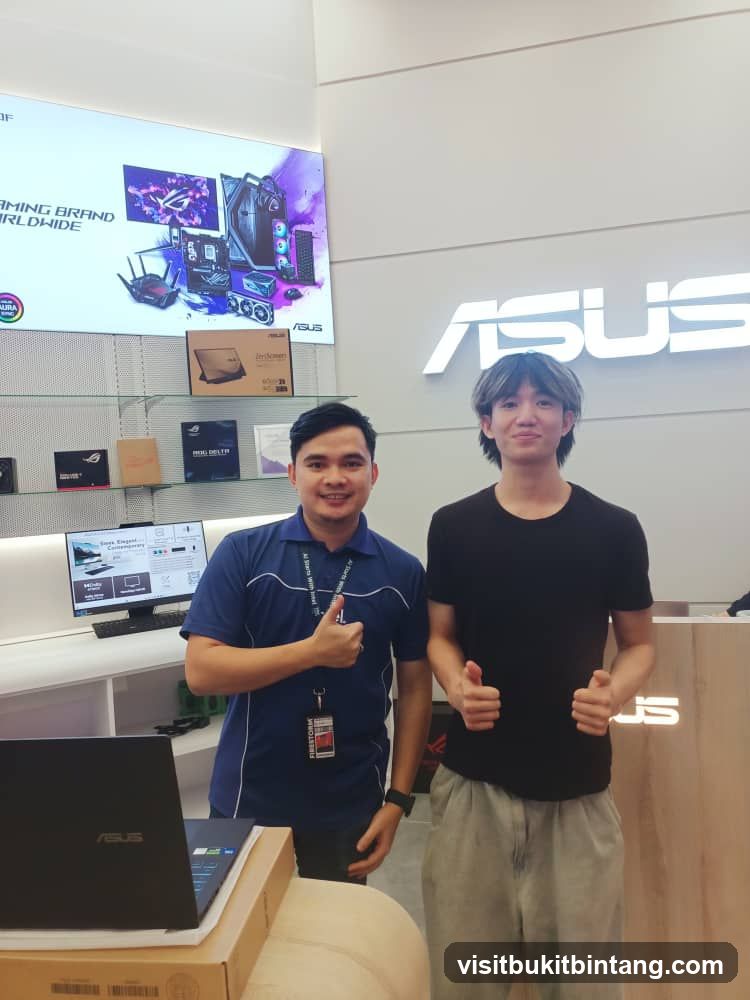 Two men posing in an ASUS store