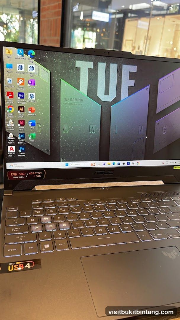 Laptop with TUF Gaming Wallpaper