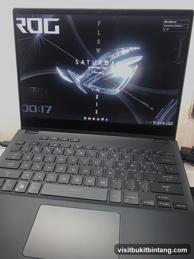 Laptop with ROG wallpaper