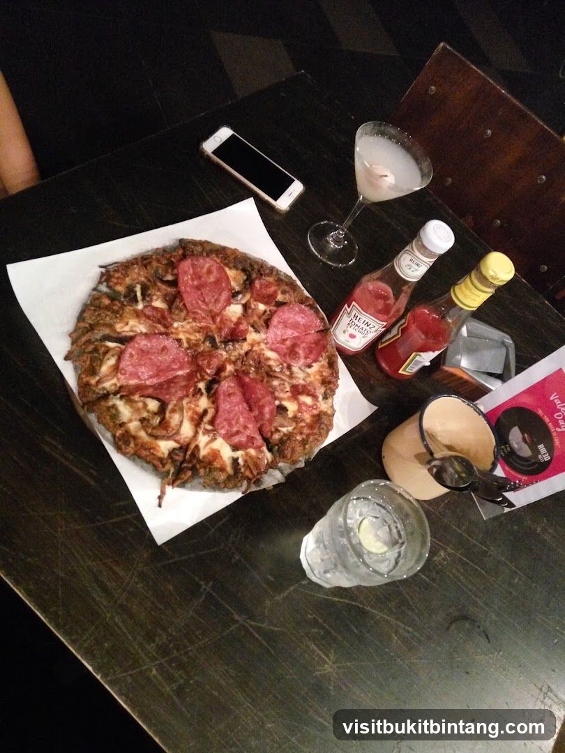 Pizza and Drinks on Table