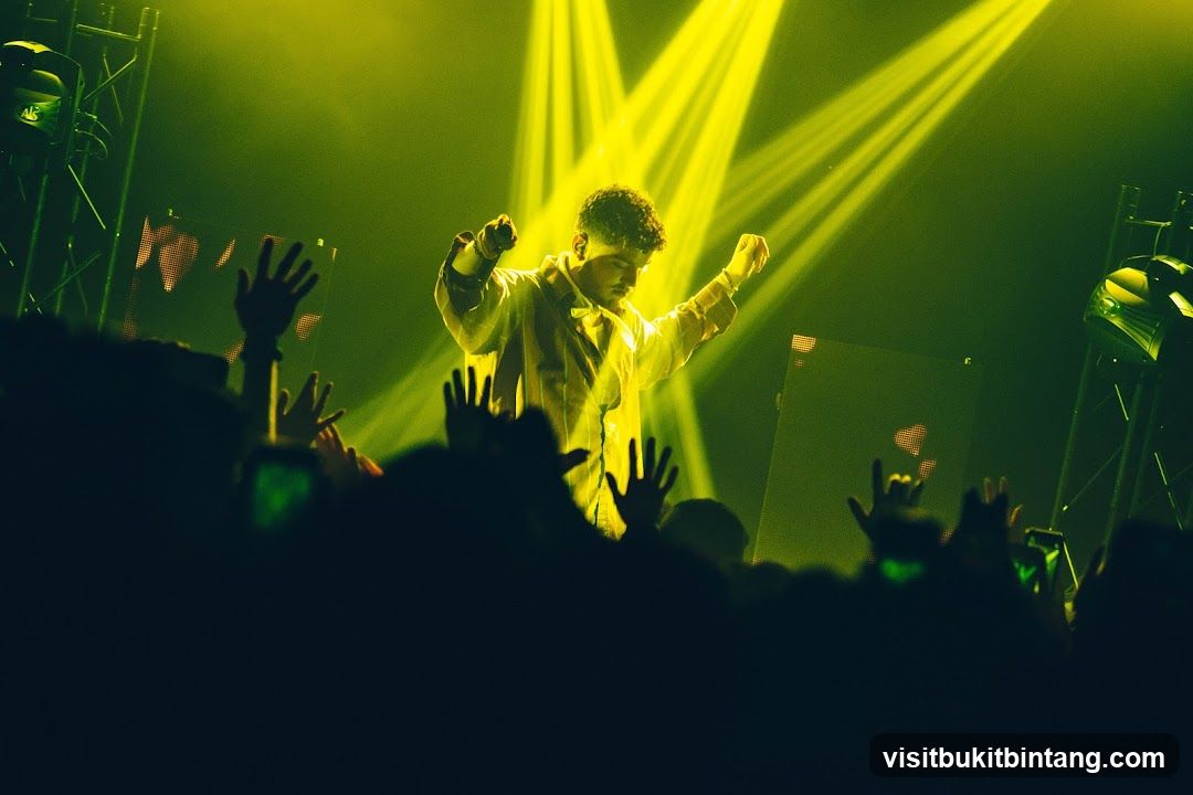 Performer on stage with audience