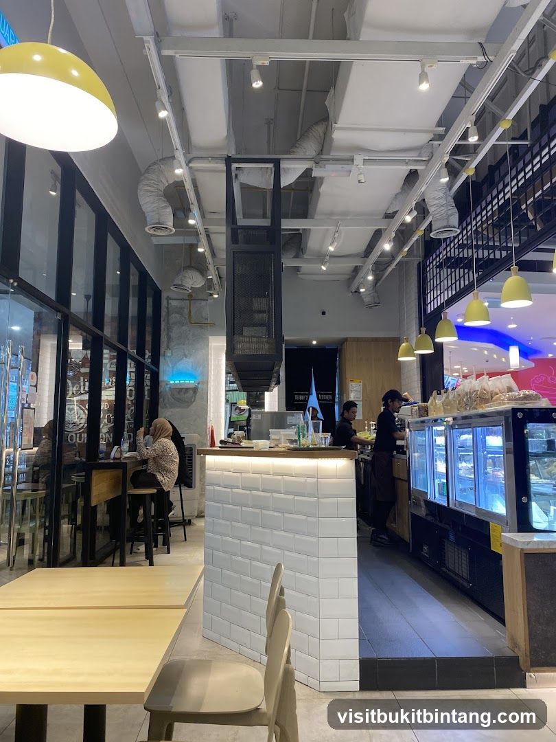 Interior of a cafe with seating and a counter