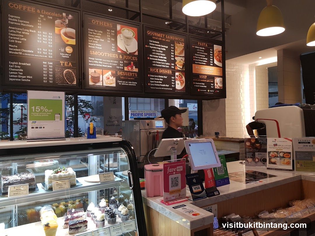 Cafe Interior with Menu Boards and Display Cases