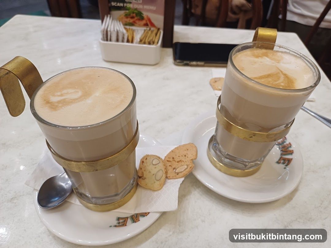 Two coffees with biscotti