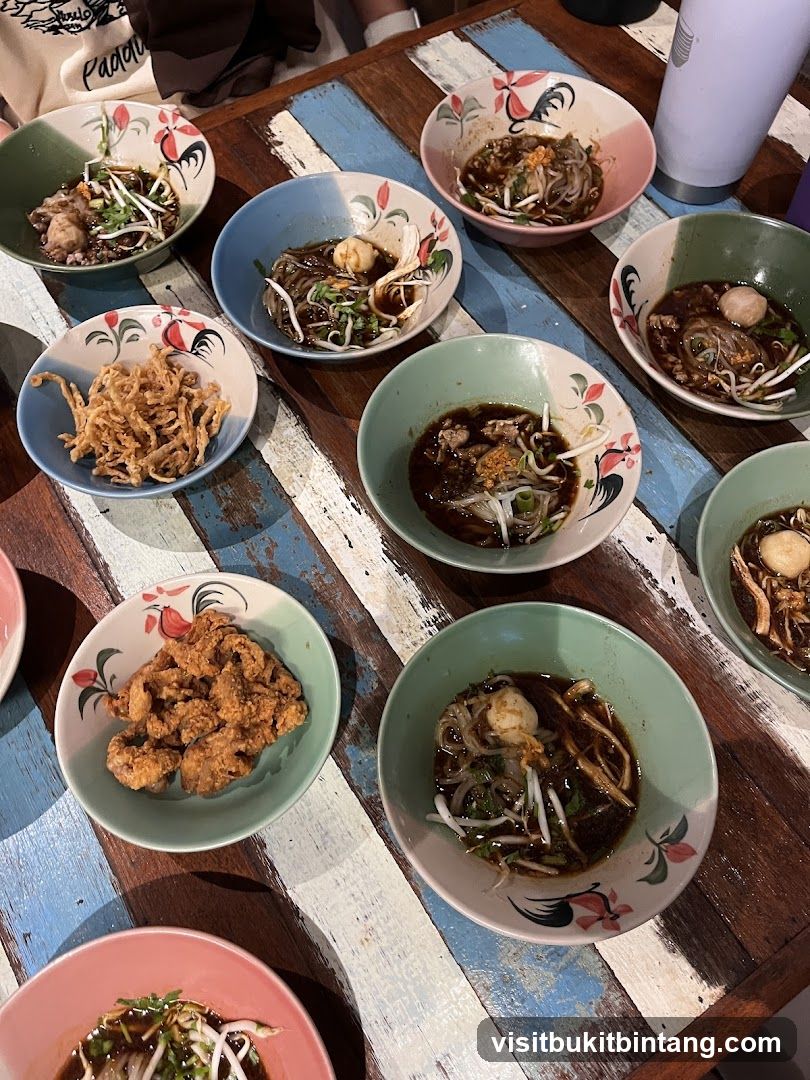 Bowls of Noodles and Fried Appetizer