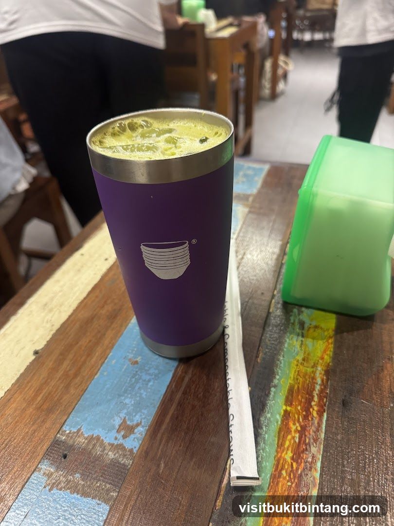 Green Drink in Purple Tumbler