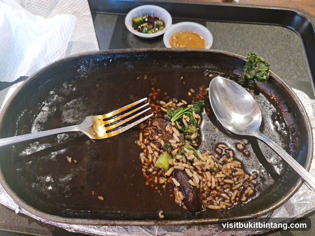 Sizzling Plate with Rice and Vegetables